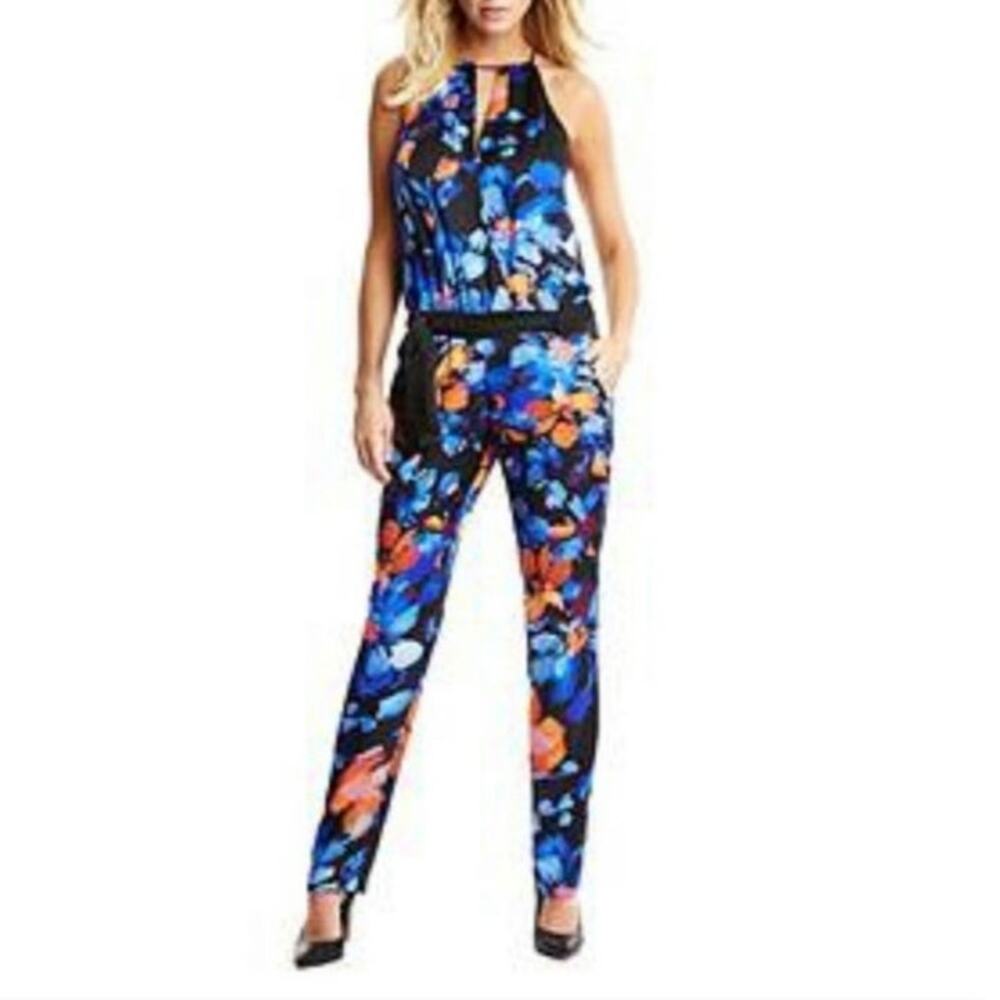Size 4 Marciano navy blue and orange floral jump suit, deep v front and back